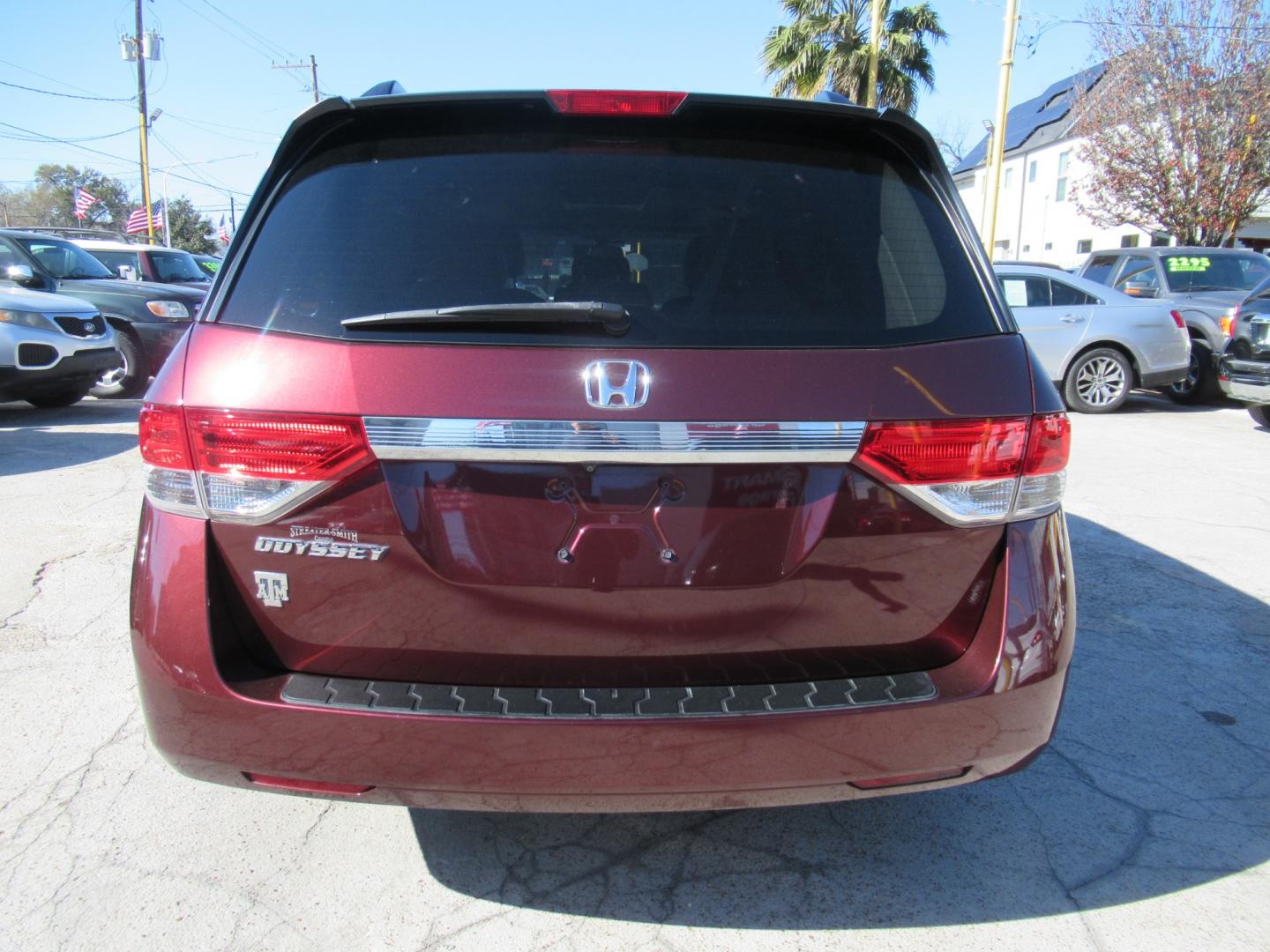 2016 Red /Tan Honda Odyssey EX-L (5FNRL5H62GB) with an 3.5L V6 SOHC 24V engine, Automatic transmission, located at 1511 North Shepherd Dr., Houston, TX, 77008, (281) 657-1221, 29.798361, -95.412560 - 2016 HONDA ODYSSEY EX-L VIN: 5FNRL5H62GB103369 5 F N R L 5 H 6 2 G B 1 0 3 3 6 9 VAN 3.5L V6 F SOHC 24V GASOLINE FRONT WHEEL DRIVE - Photo#38